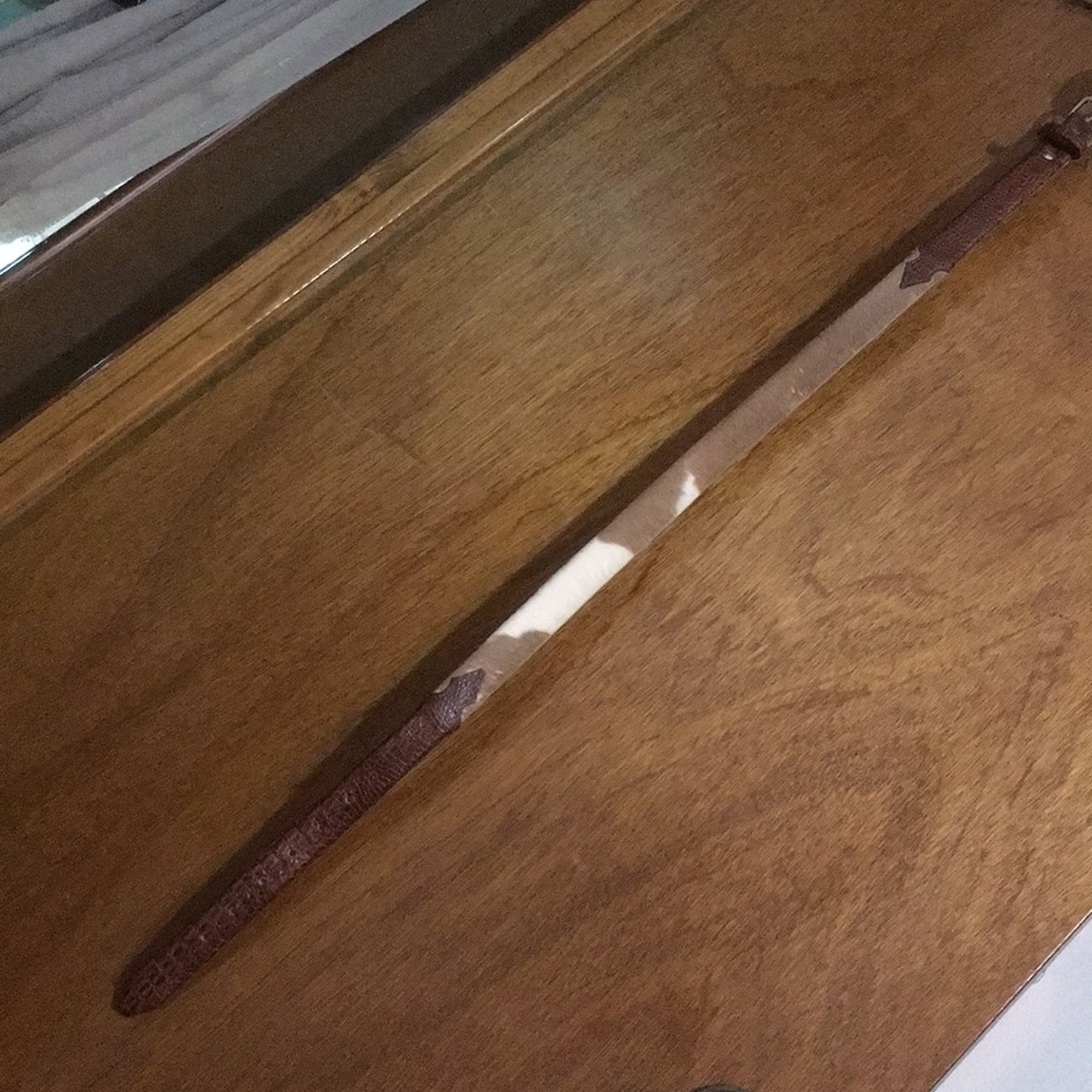 Brown cow hide belt